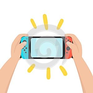 Hands holding portable console.