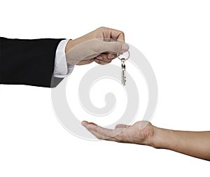 Hands holding and receiving keys, isolated on white background