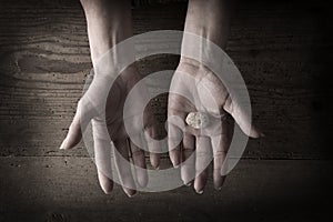 Hands holding rocks