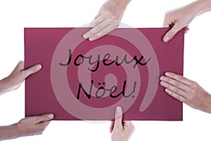 Hands Holding Sign Joyeux Noel