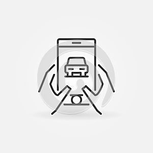 Hands holding smartphone with car icon