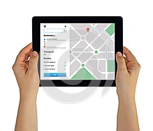 Hands holding tablet with location tracker concept on screen. GP