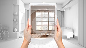 Hands holding tablet showing modern living room, big window, total blank project background, augmented reality concept,