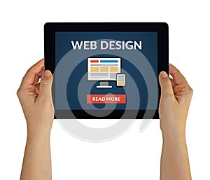 Hands holding tablet with web design concept on screen