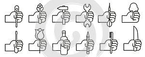 Hands holding things in a thin line. Various objects in human hands. Hand with objects vector set