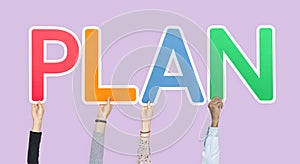 Hands holding up colorful letters forming the word plan