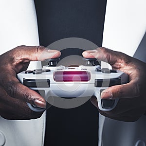 Hands holding video game controller