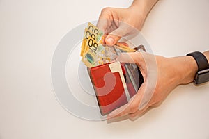 Hands holding wallet with australian dollars and counting money
