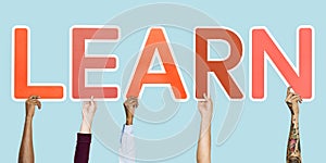 Hands holding the word learn