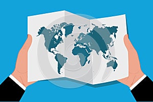 Hands holding world map in flat style, vector illustration