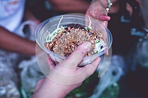 Hands of hungry beggar requesting free food from volunteers : concept of giving and sharing