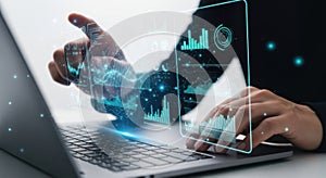 Hands interacting with futuristic digital interface data analysis technology on laptop