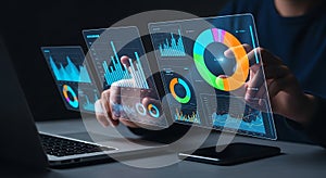 Hands interacting with glowing holographic data visualizations on multiple screens