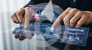 Hands interacting with holographic display showing financial charts and data analytics interface