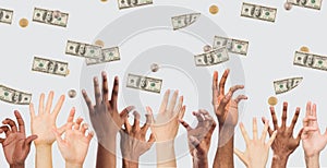 Hands of international young people rising to sky for falling money, panorama, free space, collage