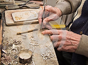 Hands of jeweller