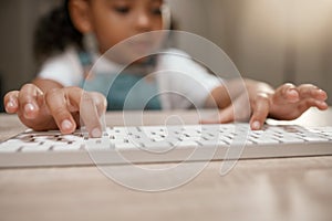 Hands, keyboard and education with a student girl typing while remote or distance learning from home. Laptop, study and