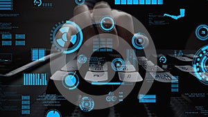 Hands on a Keyboard with Futuristic Overlay of Digital Interface Elements Representing Data Analysis and Technology