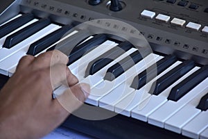 Hands of a keybord player during a live performance photo