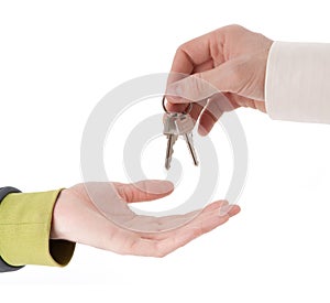 Hands with keys - Handing over the keys