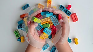 The Hands of the kids hold colorful toy bricks and blocks for building toys on a white background. Generative AI