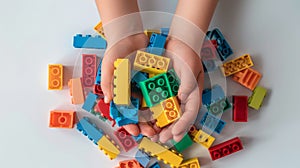 The Hands of the kids hold colorful toys bricks and blocks for building toys on a white background. Generative AI