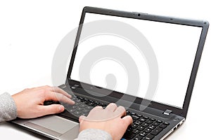 Hands on a laptop computer with blank screen isolated