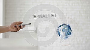 Hands launch the Earth`s hologram and E-wallet text