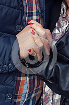 Hands in love of the happy couple bonded together