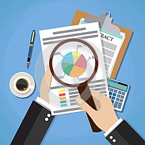 Hands with magnifier analysis paper sheet