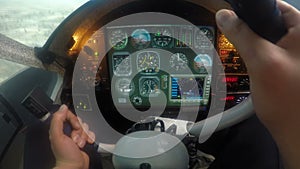 Hands of male pilot navigating plane with steering wheel, aircraft falling down