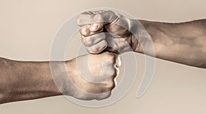 Hands of man people fist bump team teamwork, success. Man giving fist bump. Team concept. People bumping their fists