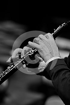 Hands of man playing the oboe