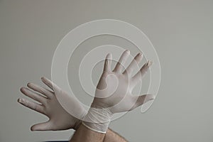 Hands of a man protected from coronavirus