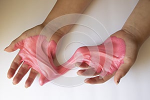 Hands Manipulating Pink Slime