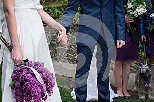 Hands of married couple on their wedding