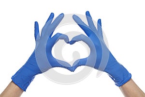 Hands in medical gloves making heart isolated on white background photo