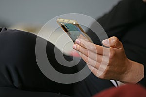 hands with mobile phone