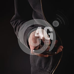 Hands with mobile phone in 4G LTE network photo
