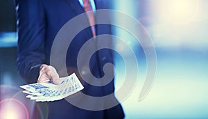 Hands, money and business man with euros, lens flare and mockup space background. Closeup, cash and rich professional in