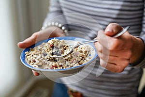 Hands and muesli