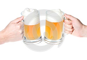 Hands with mug of beer cheers