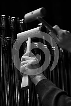 Hands musician playing the orchestral bells