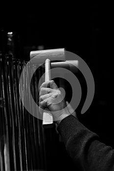 Hands musician playing the orchestral bells