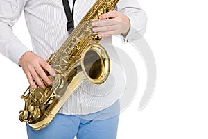 Hands musician playing the saxophone