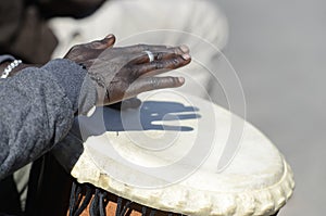 Hands of musician playing the tomtoms