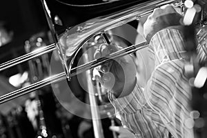 Hands musician playing the trombone in the orchestra