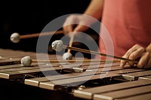 Hands of musician playing the vibraphone