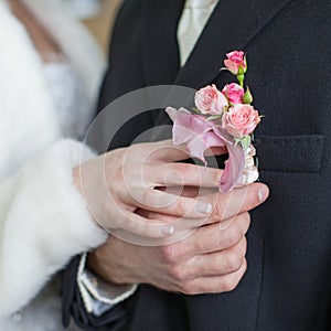 Hands of newly wedded before wedding ceremony