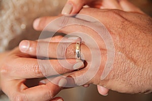 Hands of newlywed couple